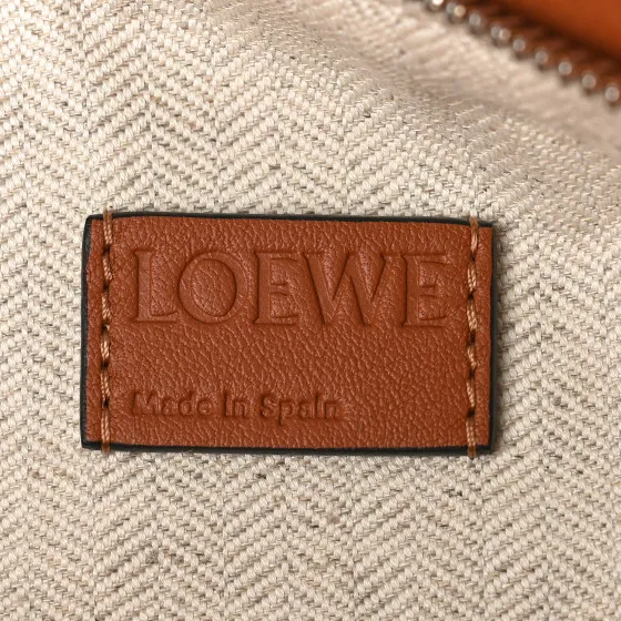 Eliminating the middleman and passing on savings to you. With massive production and tax-free benefits LOEWE Calfskin Small Puzzle Bag Tan 0123