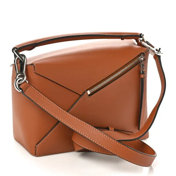 Eliminating the middleman and passing on savings to you. With massive production and tax-free benefits LOEWE Calfskin Small Puzzle Bag Tan 0123