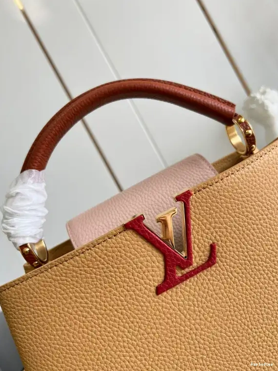 Repladies offers premium fake Louis bags at unbeatable prices. Our products are cheap because we focus on direct sales LOUIS VUITTON MM CAPUCINES 0226