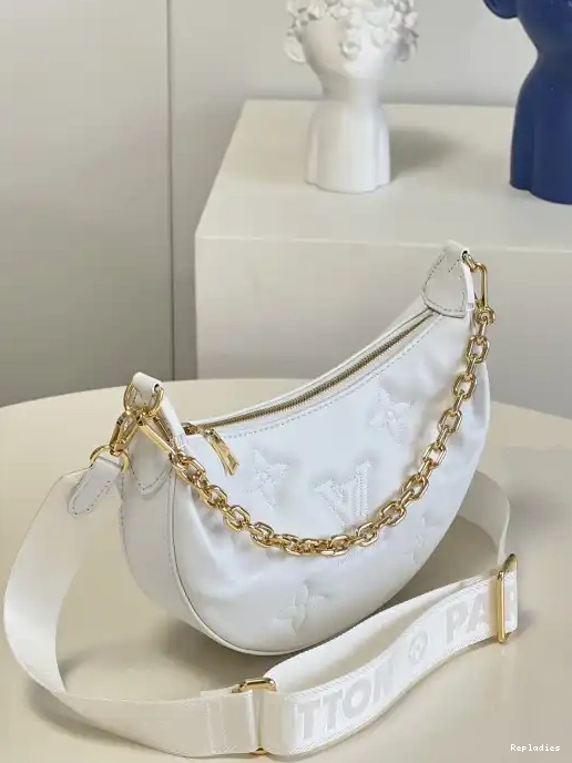 Repladies offers premium fake Louis bags at unbeatable prices. Our products are cheap because we focus on direct sales OVER THE LOUIS VUITTON MOON 0221