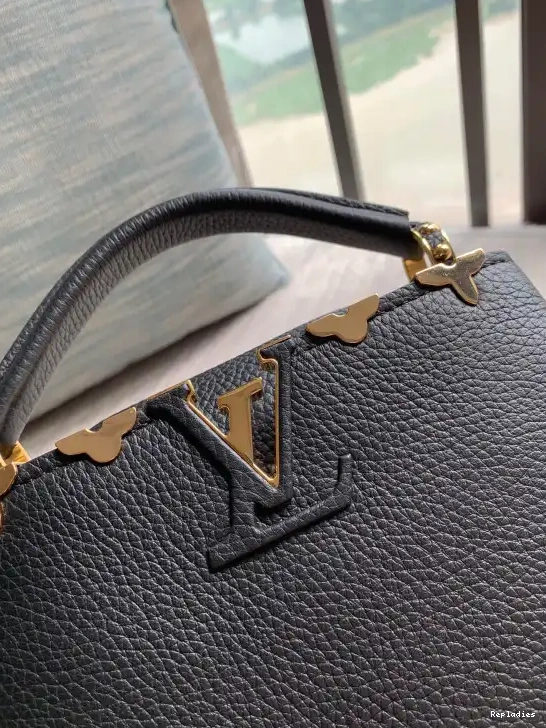 Repladies offers premium fake Louis bags at unbeatable prices. Our products are cheap because we focus on direct sales VUITTON MINI CAPUCINES LOUIS 0214