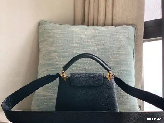 Repladies offers premium fake Louis bags at unbeatable prices. Our products are cheap because we focus on direct sales VUITTON MINI CAPUCINES LOUIS 0214