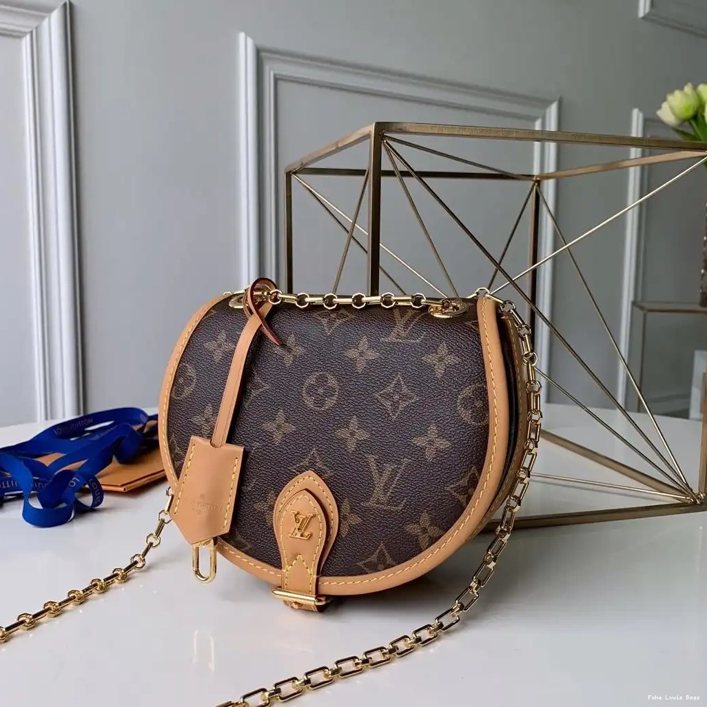 Repladies offers premium fake Louis bags at unbeatable prices. Our products are cheap because we focus on direct sales TAMBOURIN LOUIS VUITTON 0227