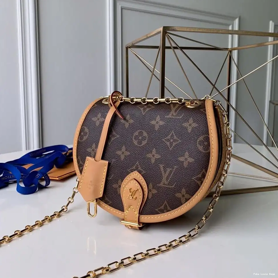 Repladies offers premium fake Louis bags at unbeatable prices. Our products are cheap because we focus on direct sales TAMBOURIN LOUIS VUITTON 0227