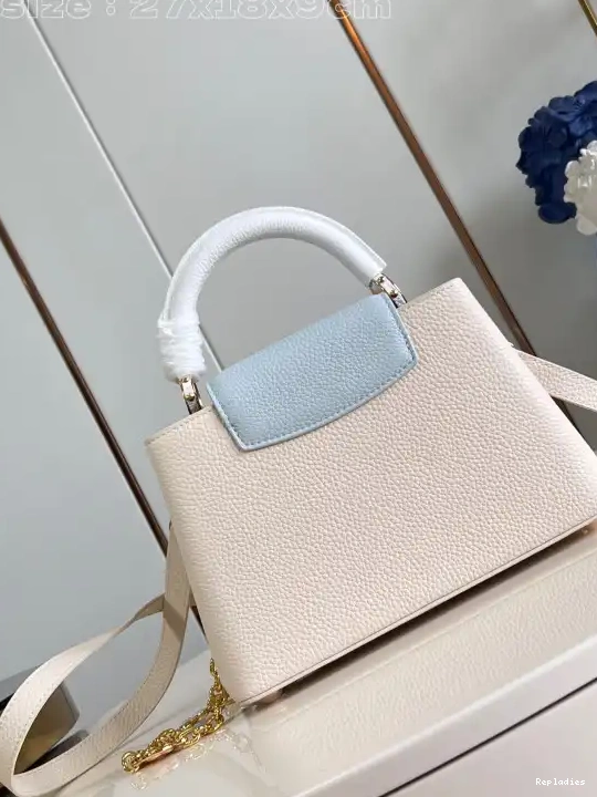 Repladies offers premium fake Louis bags at unbeatable prices. Our products are cheap because we focus on direct sales BB-27*18*9CM VUITTON CAPUCINES LOUIS 0214