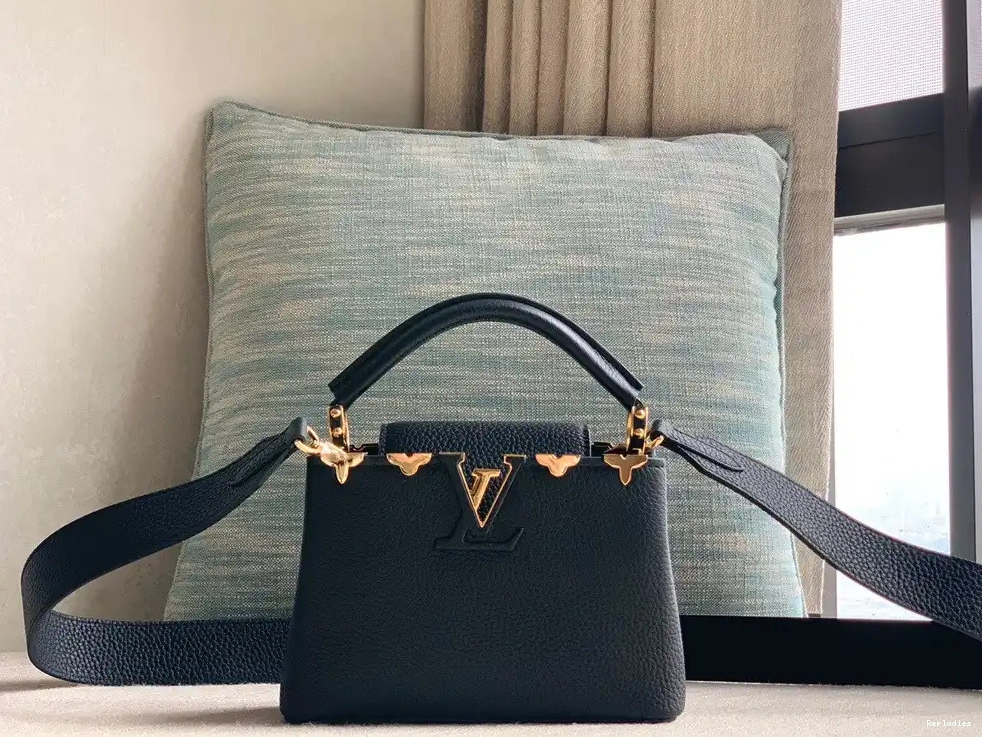 Repladies offers premium fake Louis bags at unbeatable prices. Our products are cheap because we focus on direct sales VUITTON MINI CAPUCINES LOUIS 0214