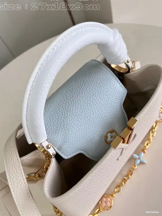 Repladies offers premium fake Louis bags at unbeatable prices. Our products are cheap because we focus on direct sales BB-27*18*9CM VUITTON CAPUCINES LOUIS 0214