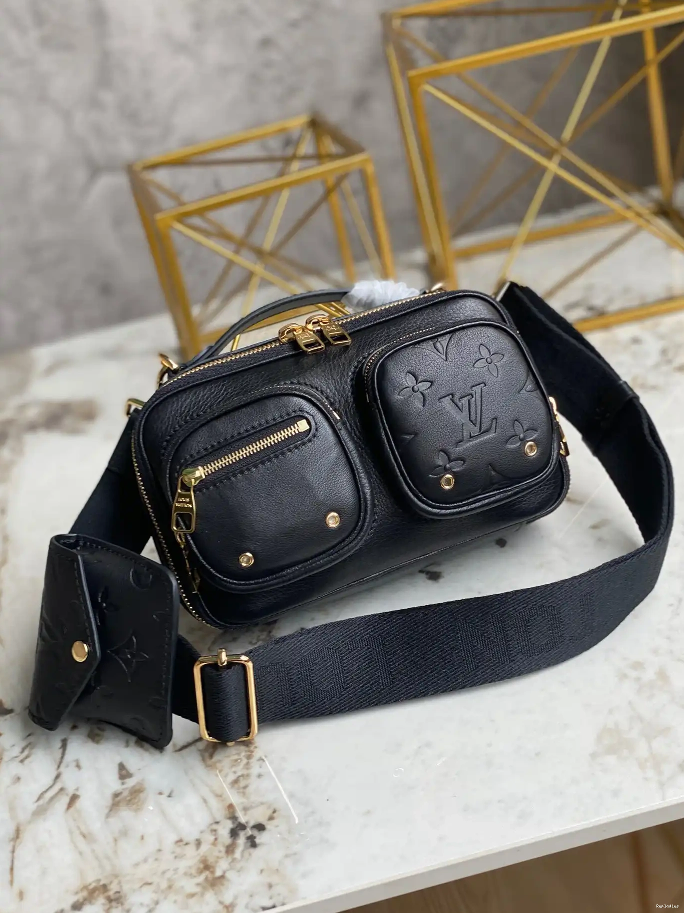 Repladies offers premium fake Louis bags at unbeatable prices. Our products are cheap because we focus on direct sales UTILITY VUITTON CROSSBODY LOUIS 0227