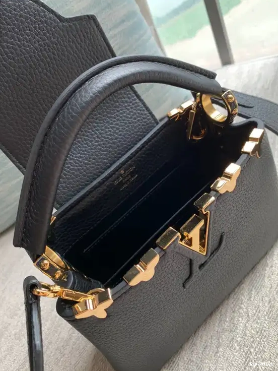 Repladies offers premium fake Louis bags at unbeatable prices. Our products are cheap because we focus on direct sales VUITTON MINI CAPUCINES LOUIS 0214