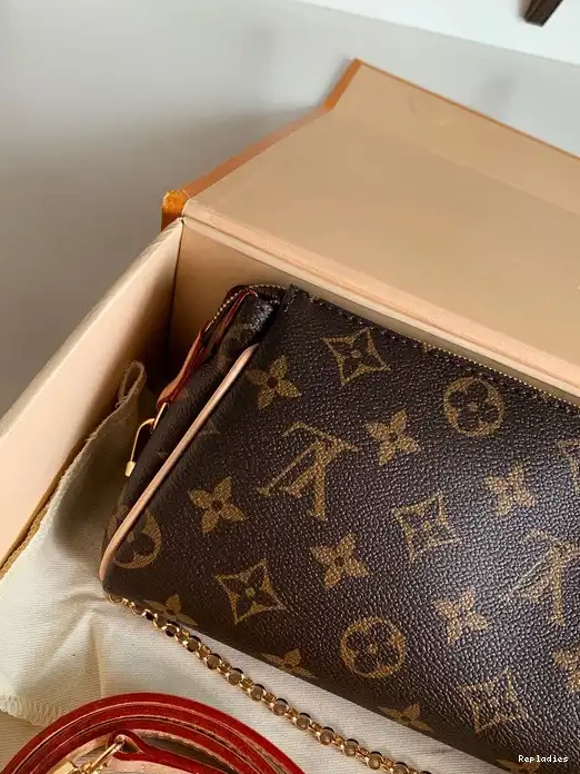 Eliminating the middleman and passing on savings to you. With massive production and tax-free benefits LOUIS VUITTON EVA 0216