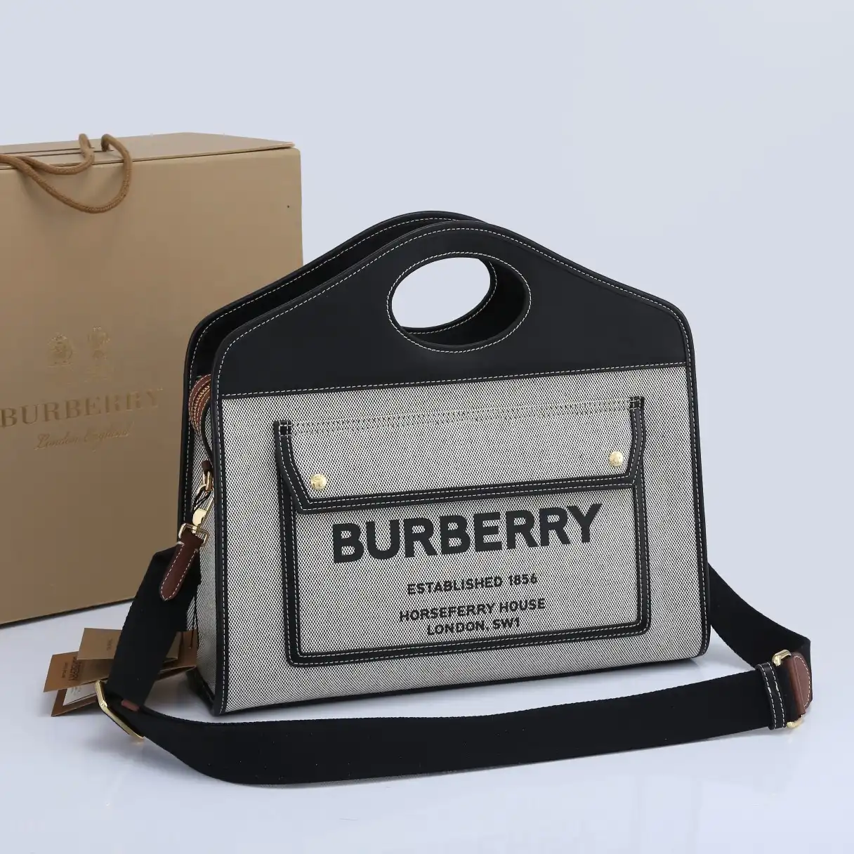 Eliminating the middleman and passing on savings to you. With massive production and tax-free benefits BURBERRY Pocket Bag-37*15*34CM 0203