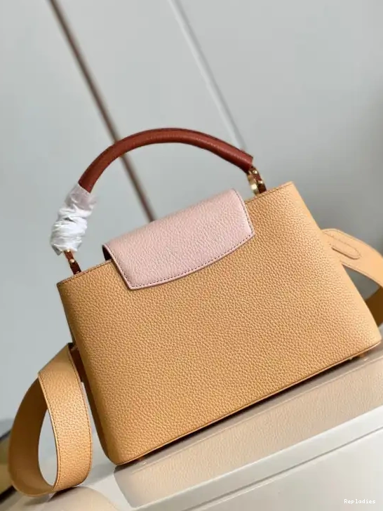 Repladies offers premium fake Louis bags at unbeatable prices. Our products are cheap because we focus on direct sales LOUIS VUITTON MM CAPUCINES 0226