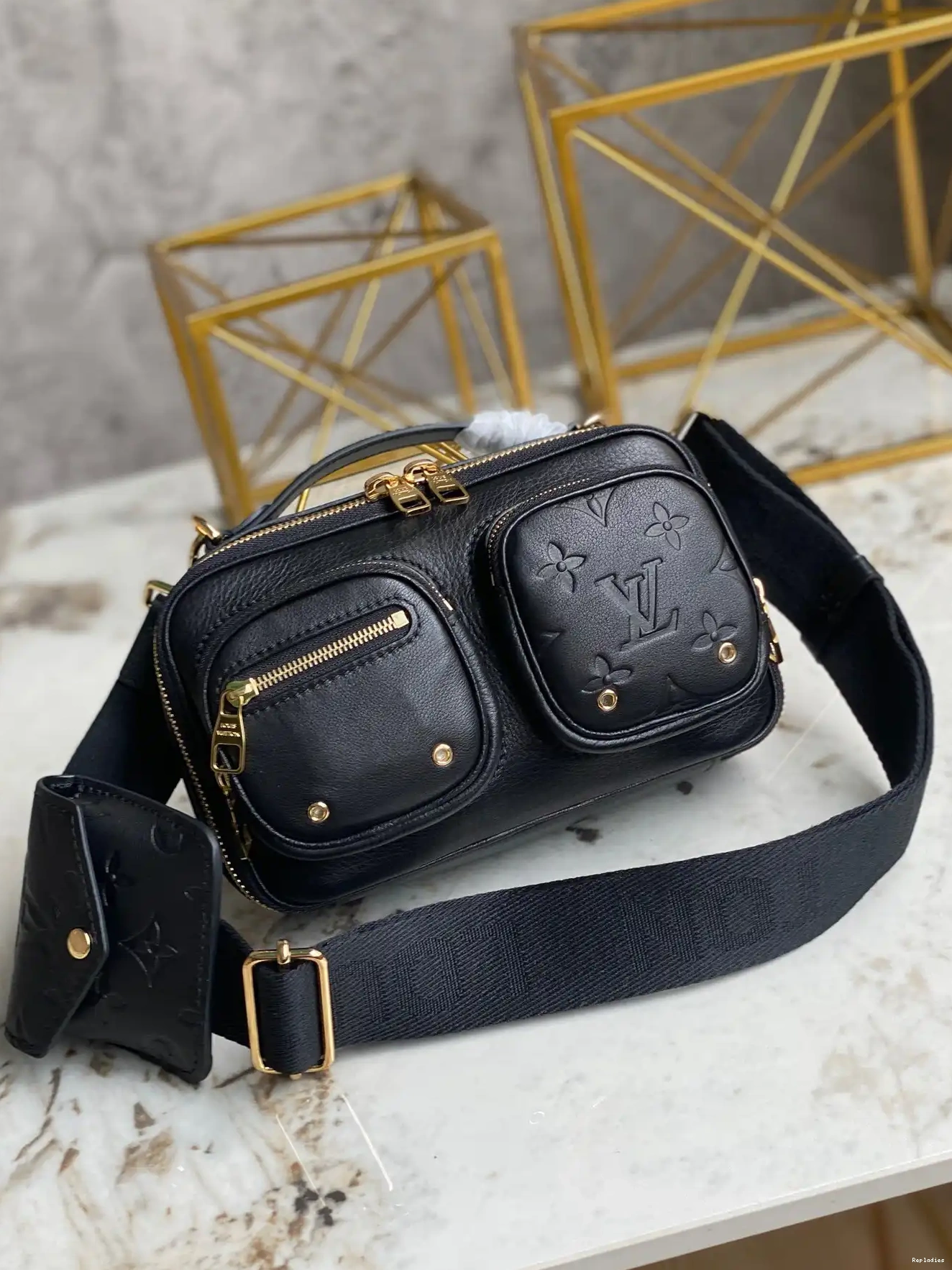 Repladies offers premium fake Louis bags at unbeatable prices. Our products are cheap because we focus on direct sales UTILITY VUITTON CROSSBODY LOUIS 0227