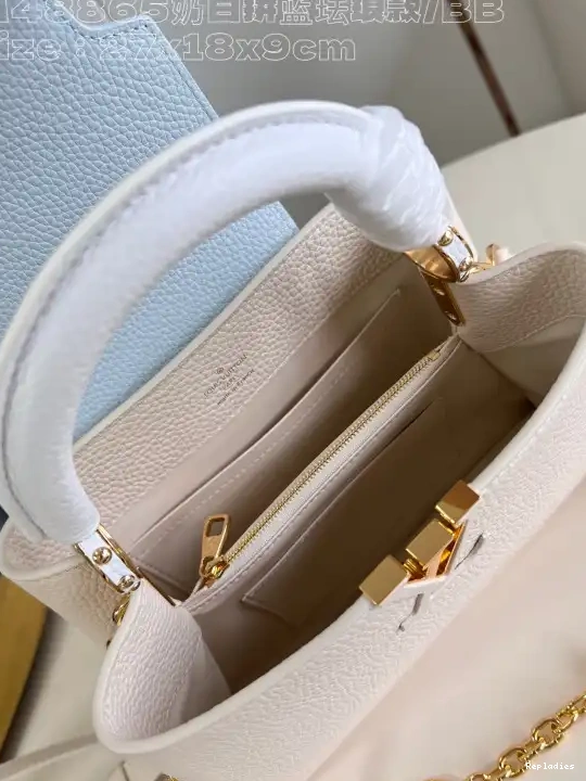 Repladies offers premium fake Louis bags at unbeatable prices. Our products are cheap because we focus on direct sales BB-27*18*9CM VUITTON CAPUCINES LOUIS 0214