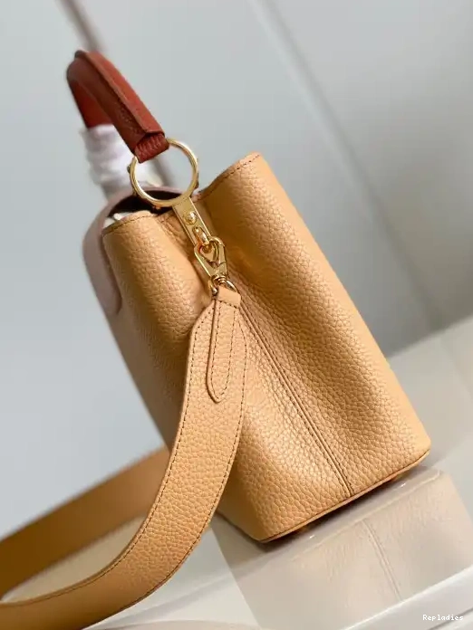 Repladies offers premium fake Louis bags at unbeatable prices. Our products are cheap because we focus on direct sales LOUIS VUITTON MM CAPUCINES 0226